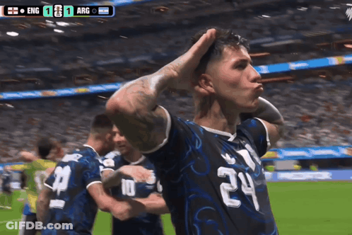 A Soccer Player With The Number 24 On His Jersey Stands On The Field GIF