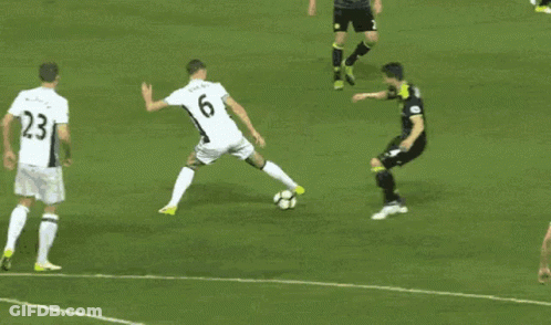 A Soccer Player With The Number 25 On His Jersey Is Trying To Get The Ball GIF
