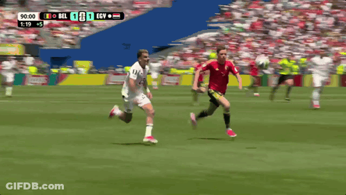 A Soccer Player With The Number 25 On His Jersey Kicks The Ball GIF