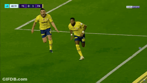 A Soccer Player With The Number 26 On His Shorts Is Laying On The Ground GIF