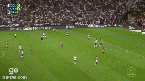 A Soccer Player With The Number 28 On His Back Is Running On The Field GIF