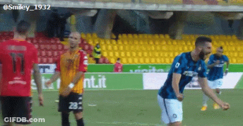 A Soccer Player With The Number 29 On His Shorts Is Standing On A Field GIF