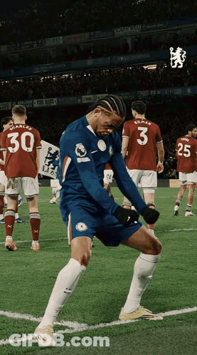 A Soccer Player With The Number 3 On His Back Is Dancing On The Field GIF