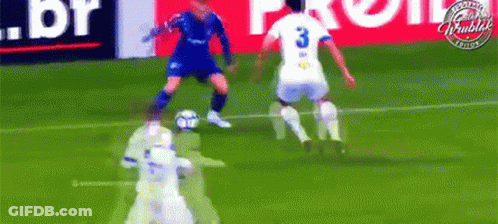 A Soccer Player With The Number 3 On His Jersey Is Kicking The Ball GIF