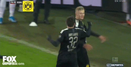 A Soccer Player With The Number 32 On His Jersey Celebrates A Goal GIF