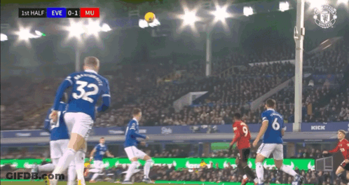A Soccer Player With The Number 32 On His Jersey Kicks The Ball GIF