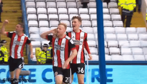 A Soccer Player With The Number 36 On His Shorts Celebrates GIF