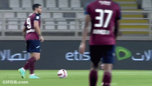 A Soccer Player With The Number 37 On His Jersey Kicks The Ball GIF