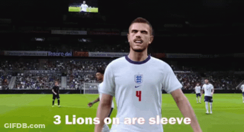 A Soccer Player With The Number 4 On His Shirt Stands On A Field GIF