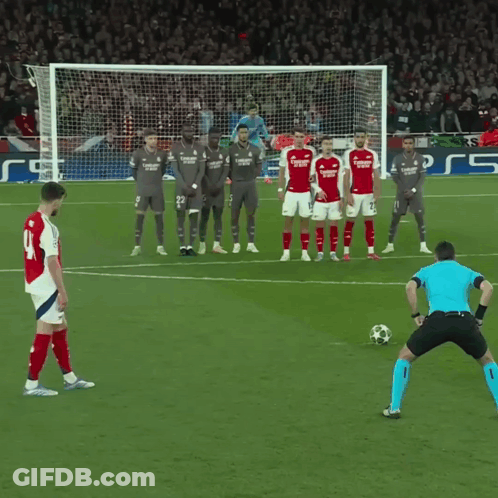 A Soccer Player With The Number 41 On His Jersey Kicks The Ball GIF