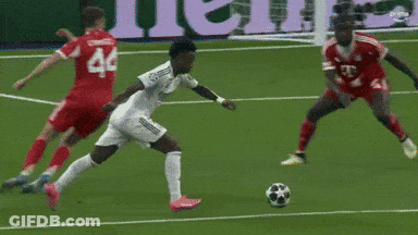 A Soccer Player With The Number 44 On His Jersey Is Trying To Kick The Ball GIF