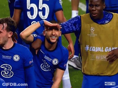 A Soccer Player With The Number 55 On His Jersey Is Surrounded By Other Players GIF