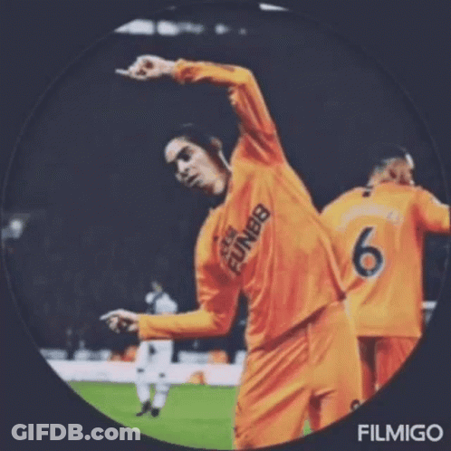 A Soccer Player With The Number 6 On His Jersey Is Dancing On The Field . GIF