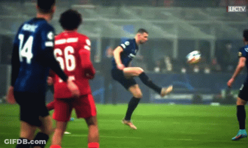 A Soccer Player With The Number 66 On His Back Is Kicking The Ball GIF