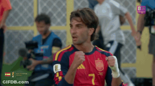 A Soccer Player With The Number 7 On His Jersey Is Celebrating GIF