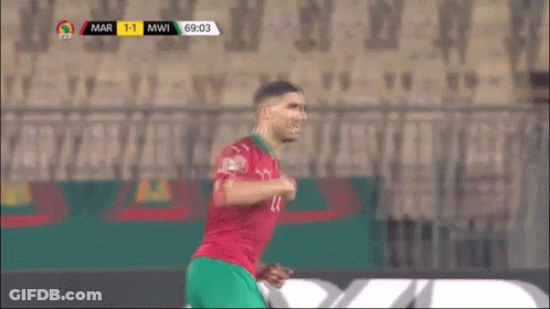 A Soccer Player With The Number 7 On His Jersey Is Running On The Field GIF