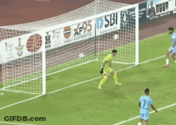 A Soccer Player With The Number 7 On His Jersey Kicks The Ball Towards The Goal GIF