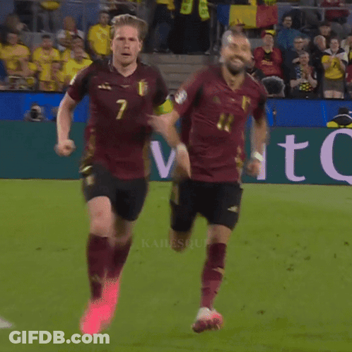 A Soccer Player With The Number 7 On His Jersey Stands On The Field GIF