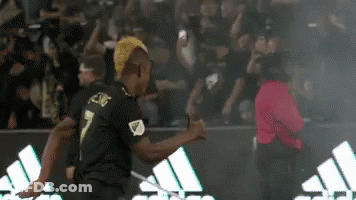 A Soccer Player With The Number 7 On The Back Of His Shirt GIF
