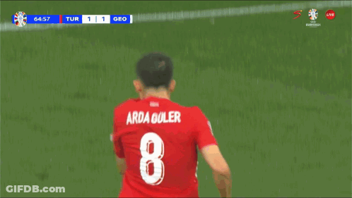 A Soccer Player With The Number 8 On His Back Is Celebrating GIF