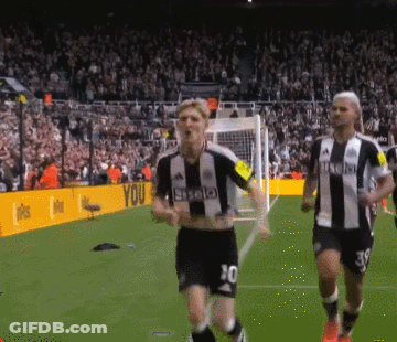 A Soccer Player With The Number 80 On His Shorts Is Running Towards The Goal GIF