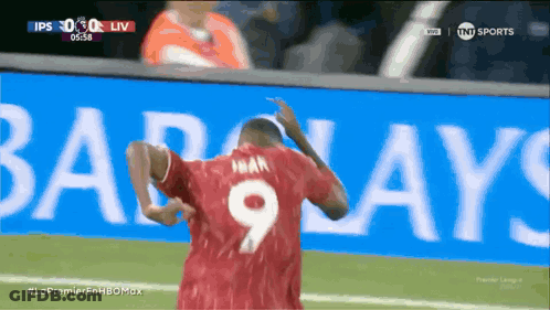 A Soccer Player With The Number 9 On His Back GIF