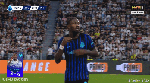 A Soccer Player With The Number 9 On His Jersey Is Celebrating A Goal GIF
