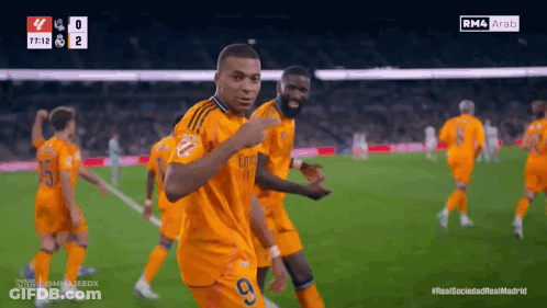 A Soccer Player With The Number 9 On His Jersey Is Celebrating GIF