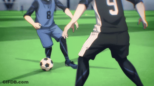 A Soccer Player With The Number 9 On His Jersey Kicks The Ball GIF