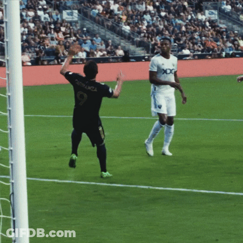 A Soccer Player With The Number 9 On The Back Of His Shirt GIF