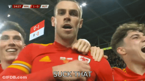 A Soccer Player With The Word Suck That Written On His Chest GIF