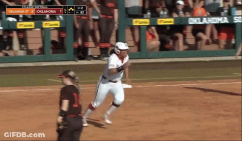 A Softball Game Is Being Played Between Oklahoma St And College Softball GIF
