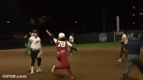 A Softball Player Wearing Number 78 Is Running Towards The Base GIF