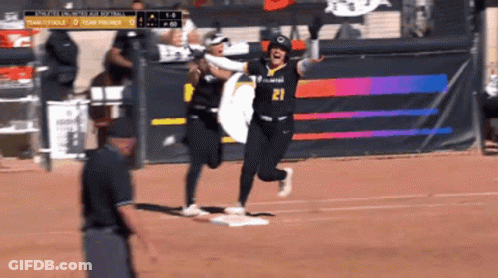 A Softball Player With The Number 21 On Her Shirt GIF