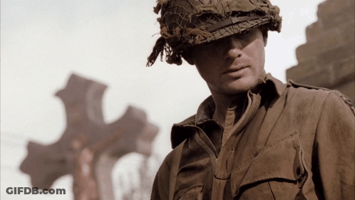 A Soldier Wearing A Helmet And A Shirt That Says ' U.s. Army ' On The Sleeve GIF