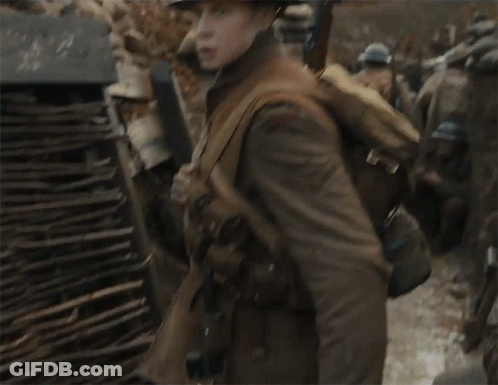 A Soldier Wearing A Helmet And Carrying A Backpack GIF