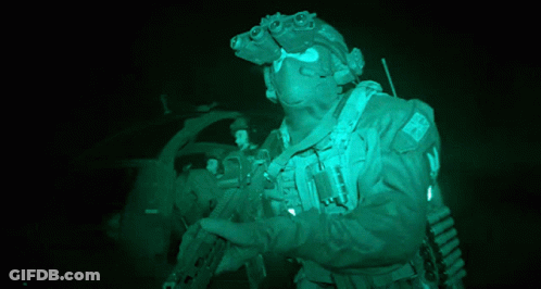 A Soldier Wearing A Helmet With A Patch That Says ' Uk ' On It GIF