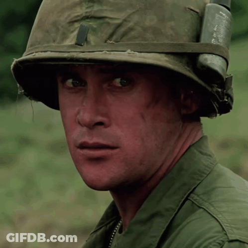 A Soldier Wearing A Helmet With The Letter S On The Front GIF