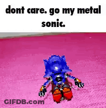A Sonic The Hedgehog Toy Is On A Pink Carpet . GIF