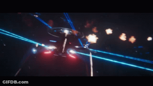 A Space Ship Is Being Attacked By A Bunch Of Laser Beams GIF