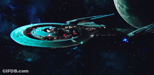 A Space Ship With A Blue Light Coming Out Of The Side GIF