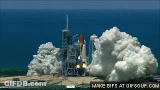A Space Shuttle Is Being Launched Into Space And Smoke Is Coming Out Of It GIF