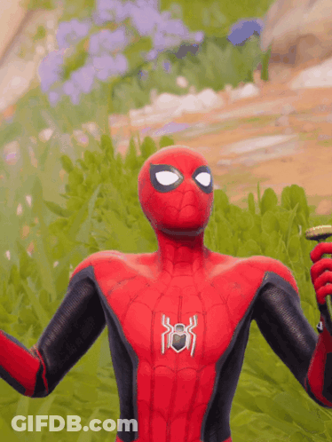 A Spider Man In A Red And Black Suit Holding A Banana GIF
