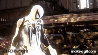 A Spider Man In A White And Black Suit Is Standing In Front Of A Building .. GIF
