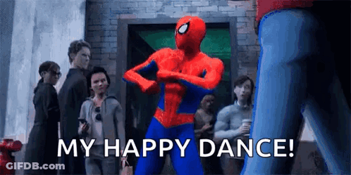 A Spider-Man Is Dancing In Front Of A Crowd Of People And Says `` My Happy Dance ! '' GIF