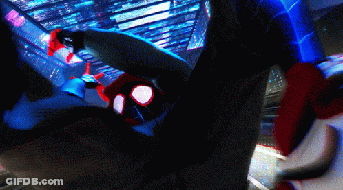 A Spider-Man Is Flying Through The Air While Wearing A Mask GIF