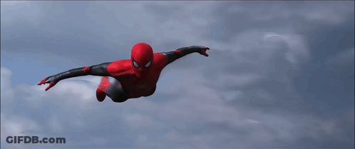 A Spider Man Is Flying Through The Air With His Arms Outstretched GIF