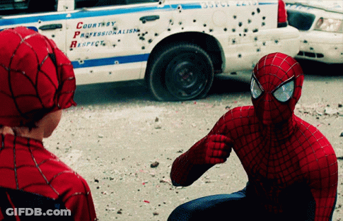A Spider Man Pointing At Another Spider Man In Front Of A Police Car That Says Courtney Professionalism Respect GIF