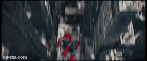 A Spider Man Standing In Front Of A City Skyline GIF