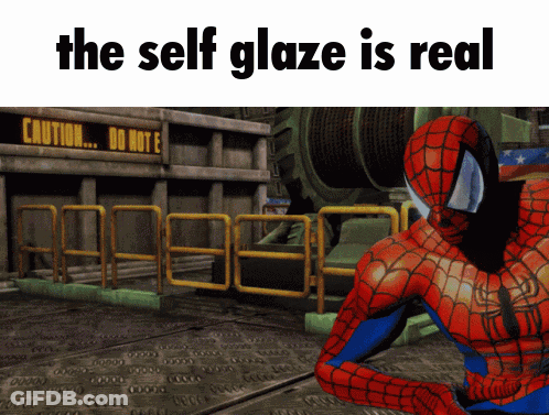 A Spider Man Standing In Front Of A Sign That Says Caution GIF